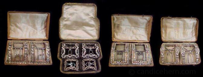Figure 2: Four buckle sets in their original satin-lined, shagreen cases.