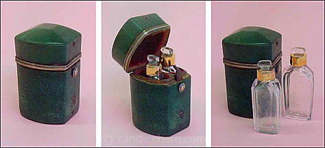 Figure 4: Double case of shagreen (1 3/4" tall) with sterling fittings; interior lined in red velvet. Two cut lead crystal bottles (1 1/2" tall) with gold collars and ground stoppers. c. 1790