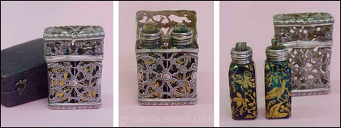 Figure 7: Pierced sterling case (1 3/4" tall) with its own fitted black shagreen case. Two matching bottles in green Bristol glass with a Chinoiserie design painted in gilt by James Giles, sterling collars, and ground stoppers. Bottom of silver case engraved with initials "A.O." Accompanying documentation dates this piece to 1770.